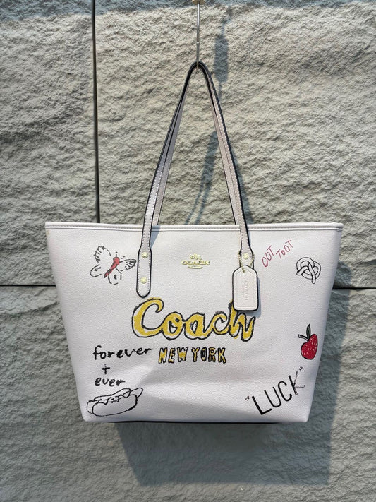 Cartera coach blanca